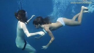 Stripped gals on Tenerife having fun in the water
