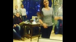 arab adolescent dancing with friends in Cafe