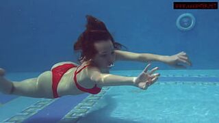 Darkis large big boobs cute Mia Ferrari swims in the pool