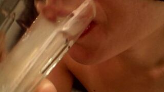 newbie girlfriend plays with a glass of sperm